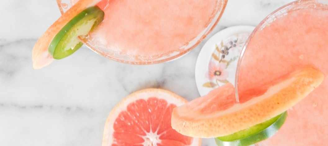 Two drinks with fruit slices